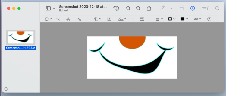 The Preview app now shows just the mouth with part of an orange circle nose above it. 