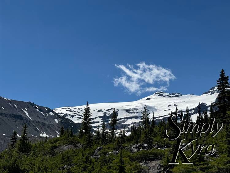 Mountains, glacier, cloud, blue, and green.