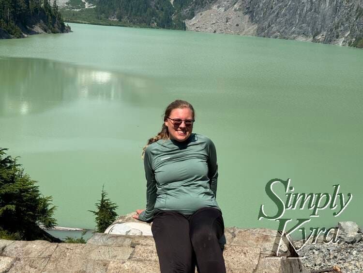 Photo by the water while sitting on the rocks.