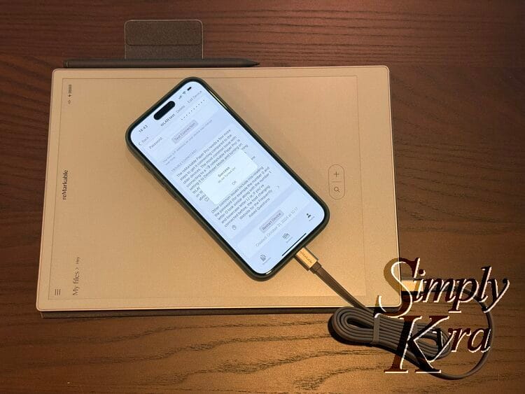 Image shows the reMarkable Paper Pro connected via USB cable to my iPhone.